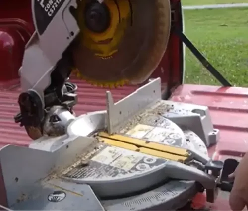 mitre saw being repaired