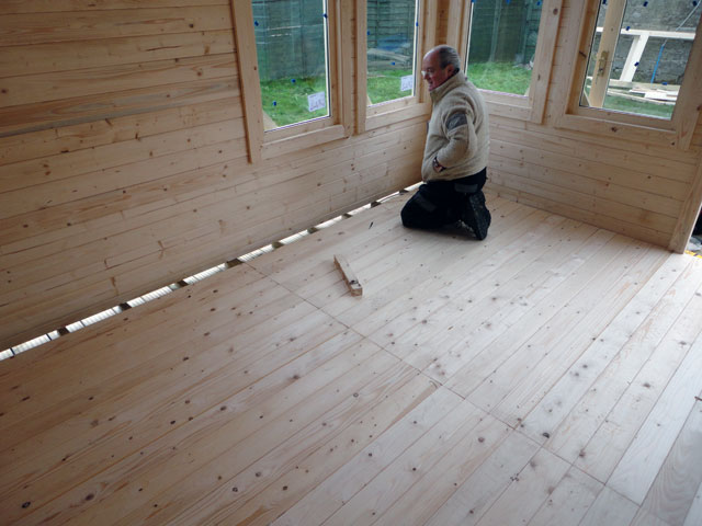 Fixing skirting boards to a wall