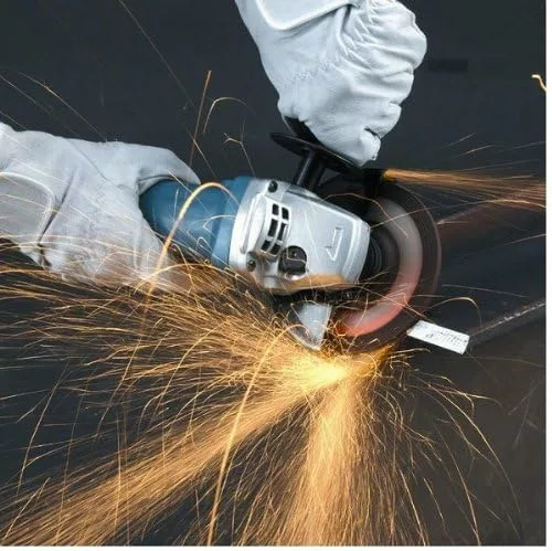 Man using the Makita GA5030R/2 angle grinder