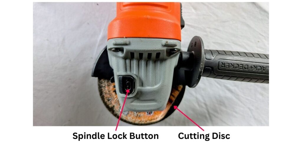 My black and decker angle grinder showing spindle lock and disc