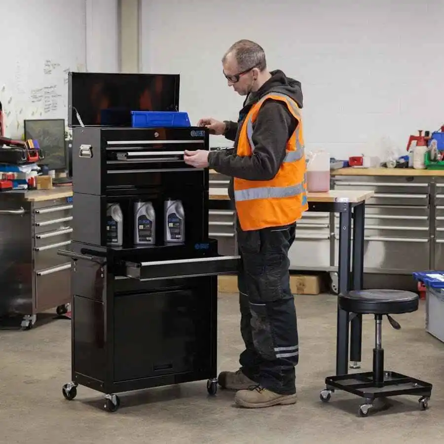 man opening the drawer of an SGS 4 drawer rolling tower