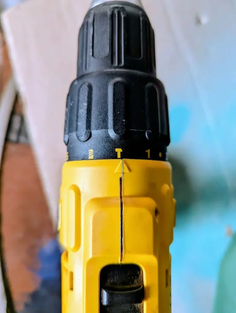 my dewalt dcd776 combi drill showing the torque collar drill and hammer drill icons